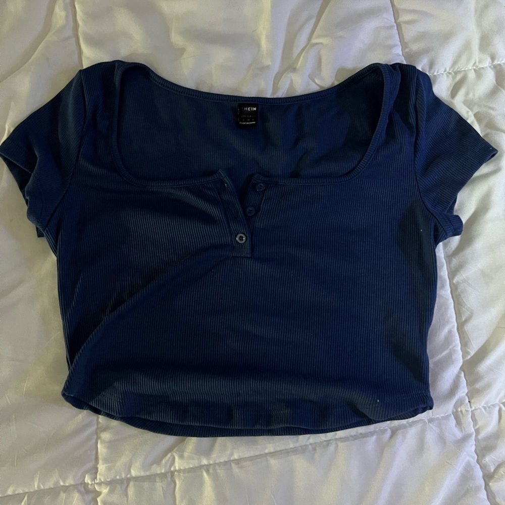 Dark blue crop top.